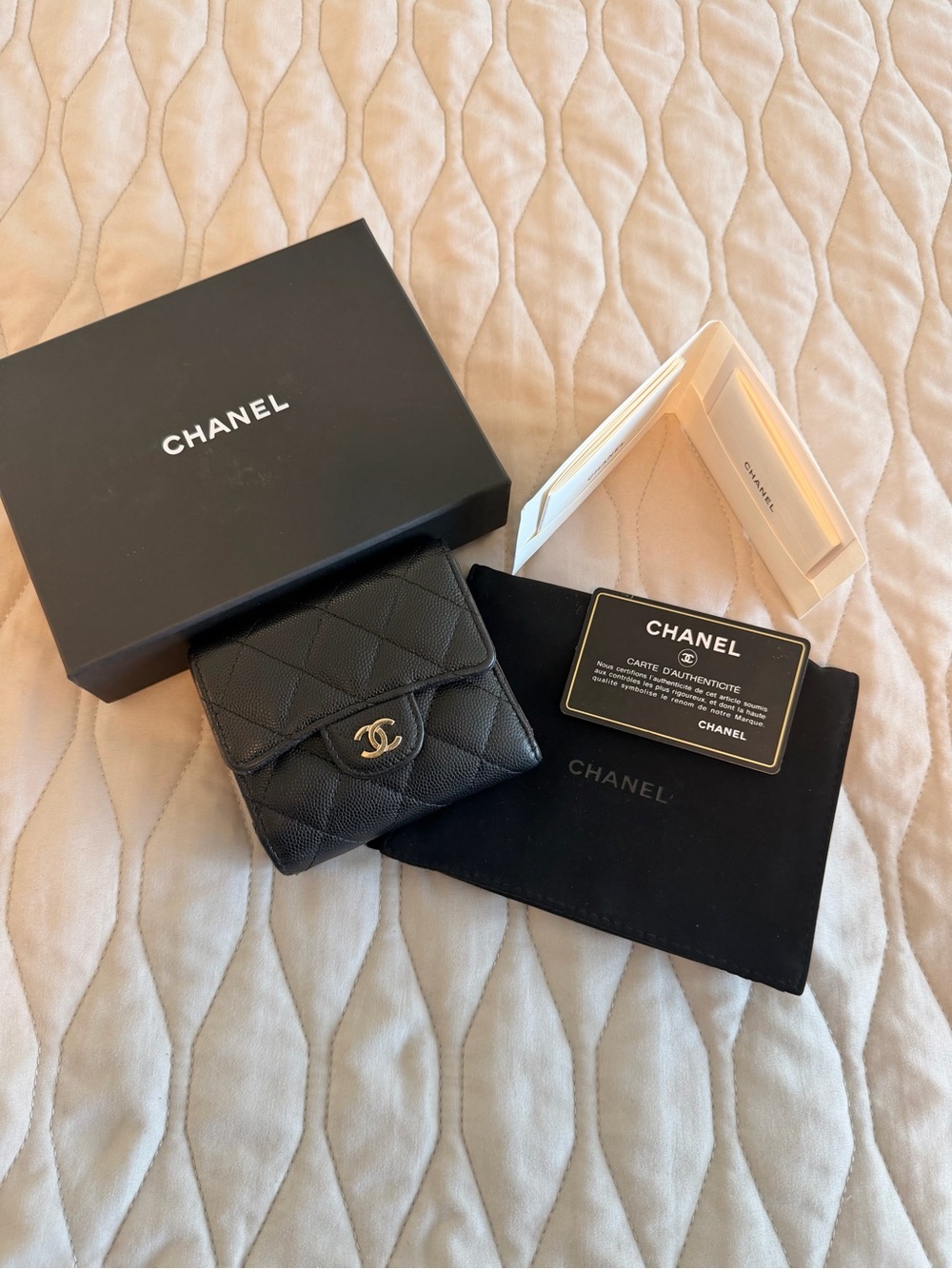 Chanel Black Quilted leather trifold classic flap Wallet caviar in gold hardware